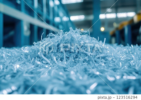 Blue shavings at recycling facility 123516294