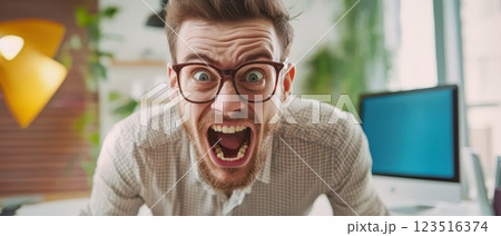 Frustrated man in office setting 123516374