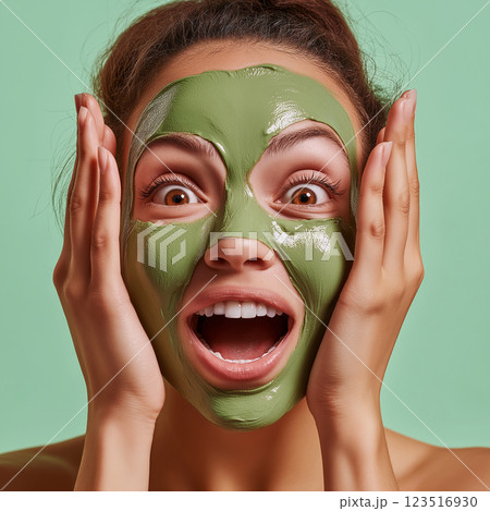 Spa beauty skincare with green mask: facial relaxation, wellness, and woman expression surprise Spa beauty skincare with green mask: facial relaxation, wellness, and woman expression surprise 123516930
