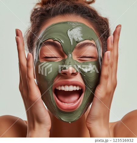 Skincare facial for a glowing, happy look with a green beauty relaxation mask treatment Skincare facial for a glowing, happy look with a green beauty relaxation mask treatment 123516932