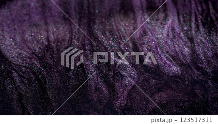 Ink flow. Liquid drip. Gray purple black paint stream spill over abstract shimmering background fluid surface. Dark art spray mix defocused spatter. Ink flow. Liquid drip. Gray purple black paint stream spill over abstract shimmering background fluid surface. Dark art spray mix defocused spatter. 123517311