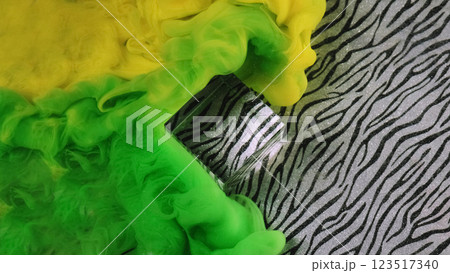 Cube magic abstract. Paint zebra ink. Defocused green yellow color haze fume fog mist texture splash smoke liquid on light background. 123517340