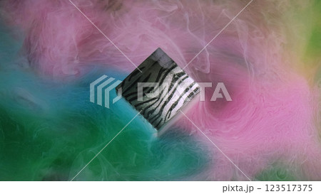 Paint cube. Glow ink texture. Defocused pink blue green haze fume splash mist fog cloud water liquid smoke on abstract art background. Paint cube. Glow ink texture. Defocused pink blue green haze fume splash mist fog cloud water liquid smoke on abstract art background. 123517375