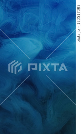 Paint fog. Blue smoke. Airy color veil wavy swirls. Fantasy texture with soft puff billow ink poured in blur water abstract background. 123517395