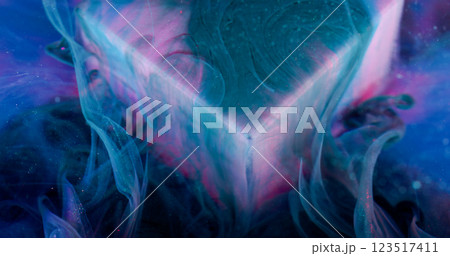 Pigment splash. Ink mist. Blue smoke swirl blend fluid. Color underwater dive crystal cube pink stand abstract blur violet background. 123517411