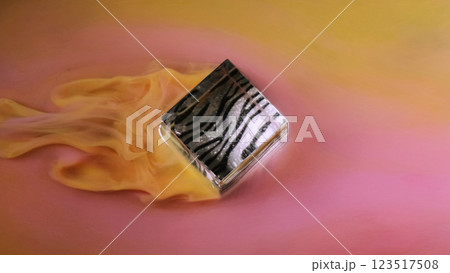 Water paint cube. Ink smooth stream. Defocused yellow pink multicolor smoke cloud haze fume mist texture on abstract art background. Water paint cube. Ink smooth stream. Defocused yellow pink multicolor smoke cloud haze fume mist texture on abstract art background. 123517508