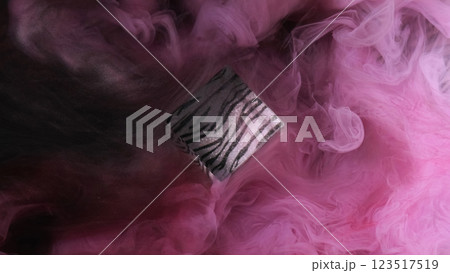 Cube color stripes. Paint liquid smoke. Defocused pink haze fume splash fog mist ink texture on abstract patterned art dark background. 123517519
