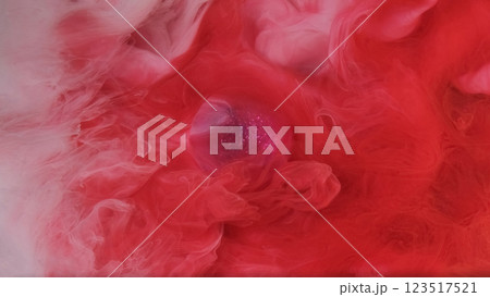 Ink water. Fluid mix. Defocused red white multicolor haze cloud vapor sparkle paint flow glitter purple Christmas ball on abstract art background. Ink water. Fluid mix. Defocused red white multicolor haze cloud vapor sparkle paint flow glitter purple Christmas ball on abstract art background. 123517521