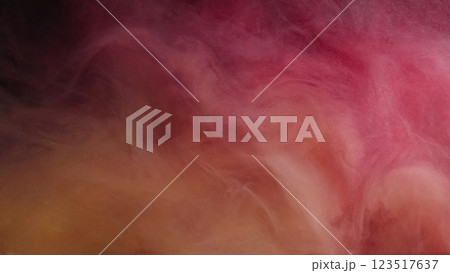 Mist creative. Ink splash water. Defocused pink orange color glow paint texture vapor sparkle flow on abstract pink art dark background. 123517637