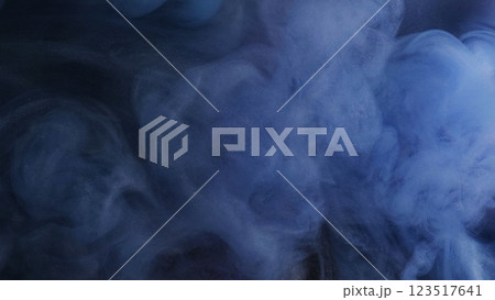 Smoke particles. Fog fluid. Mysterious blue thick mist ink swirls on defocused dark abstract background. Watercolor veil grey pigment dissolves in water. 123517641