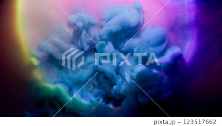 Ink vapor. Shimmering particles. Blue mist neon dye shot explosion on multicolor round sparkling liquid surface. Mystic mix water abstract background. 123517662