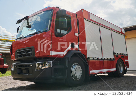 A state-of-the-art firetruck, equipped with advanced rescue technology, stands ready with its skilled firefighting team, prepared to intervene and respond rapidly to emergencies, ensuring the safety A state-of-the-art firetruck, equipped with advanced rescue technology, stands ready with its skilled firefighting team, prepared to intervene and respond rapidly to emergencies, ensuring the safety 123523434