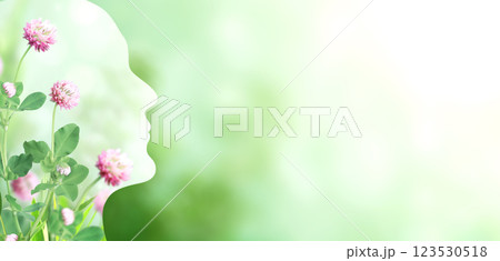 Horizontal banner with human profile made of clover flowers. Sustainable development of strategy approach to zero waste, responsible consumption. Reuse, ecology, renewable resource, eco-friendly 123530518