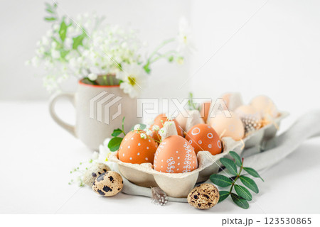A delicate Easter background with hand-painted eggs 123530865