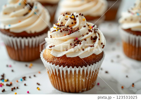 cupcake topped with cream cheese frosting, created with generative ai 123531025