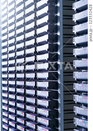 cluster of hard drives stacked inside data storage cabinet cluster of hard drives stacked inside data storage cabinet 123531428