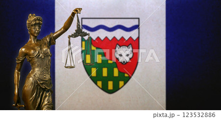 Lady Justice before a flag of the Northwest Territories Lady Justice before a flag of the Northwest Territories 123532886