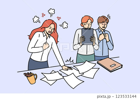 Angry woman manager shouts at frightened employees because of mistake or chaos in documents 123533144