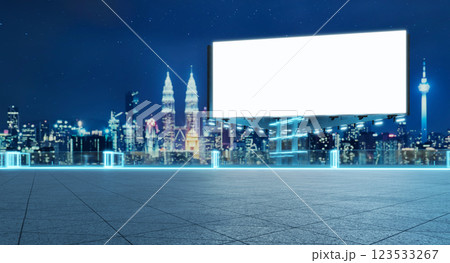 Blank billboard standing on rooftop with kuala lumpur skyline at night 123533267