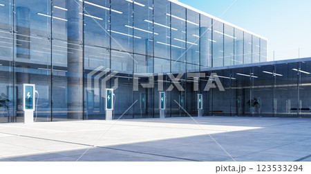 Electric vehicle charging stations powering up sustainable transportation at modern office building 123533294