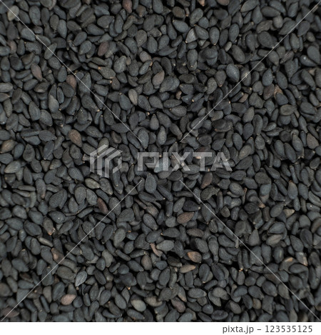 Whole black sesame seeds top view detailed shot Whole black sesame seeds top view detailed shot 123535125