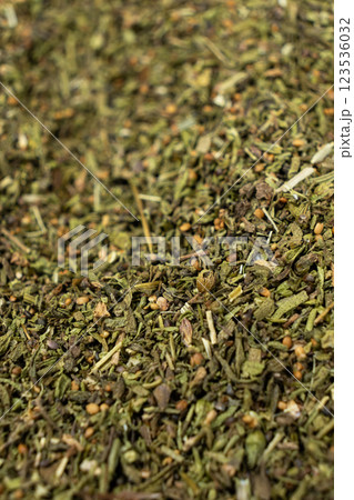 Organic dried savory leaves spice macro. 123536032