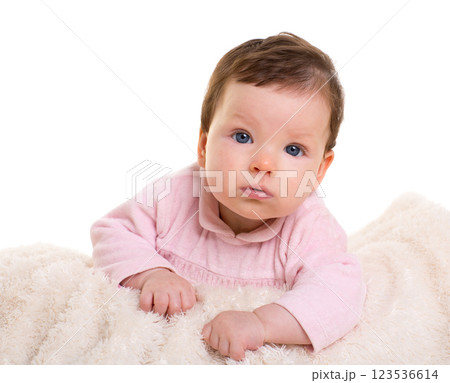 baby girl smiling in pink with winter white fur blanket baby girl smiling in pink with winter white fur blanket 123536614