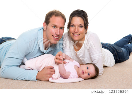 Baby mother and father happy family lying on carpet Baby mother and father happy family lying on carpet 123536894