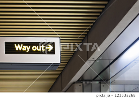 Illuminated - Way Out - sign in an underground metro station with modern architecture 123538269