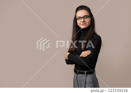 freelancer businesswoman lady with crossed arms wear eyeglasses isolated on grey background 123539156