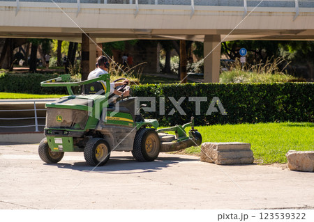 In the city park, a special car with an employee 123539322