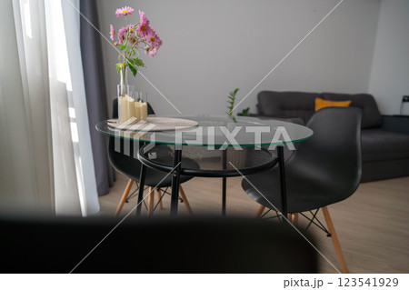 Apartment Glass Table Dining Decor: Modern Interior Design, Cozy Living Room, Relaxing Atmosphere. 123541929
