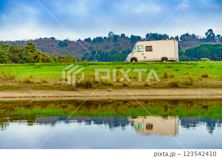 Rv caravan on lake shore. Autumn time. 123542410