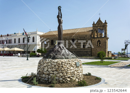 Greece, Zakynthos island-June 17, 2016: statue of Glory on the background of the Church of St. Nicholas Mola 123542644