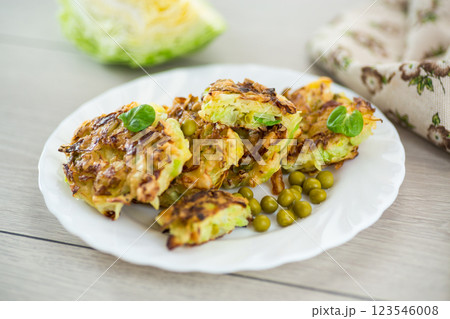 vegetable cabbage pancakes on a wooden table 123546008