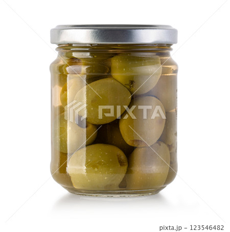 Glass jar preserving pickled green olives on white background 123546482