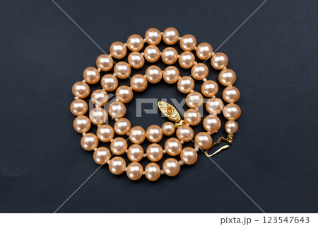 Unique necklace for women on a black background, promotional photo for an online vintage and handmade jewelry store  123547643