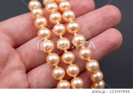 Unique necklace for women on a black background, promotional photo for an online vintage and handmade jewelry store  123547648