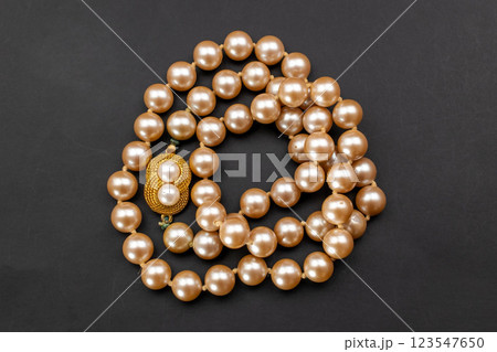 Unique necklace for women on a black background, promotional photo for an online vintage and handmade jewelry store Unique necklace for women on a black background, promotional photo for an online vintage and handmade jewelry store 123547650