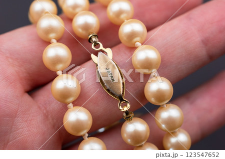 Unique necklace for women on a black background, promotional photo for an online vintage and handmade jewelry store  123547652