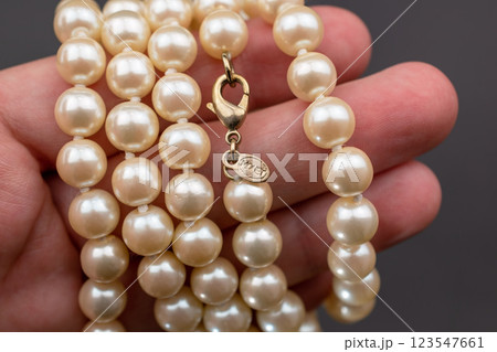 Unique necklace for women on a black background, promotional photo for an online vintage and handmade jewelry store  123547661