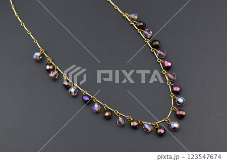 Unique necklace for women on a black background, promotional photo for an online vintage and handmade jewelry store  123547674