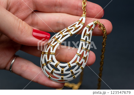 Unique necklace for women on a black background, promotional photo for an online vintage and handmade jewelry store Unique necklace for women on a black background, promotional photo for an online vintage and handmade jewelry store 123547679