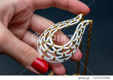 Unique necklace for women on a black background, promotional photo for an online vintage and handmade jewelry store  123547680