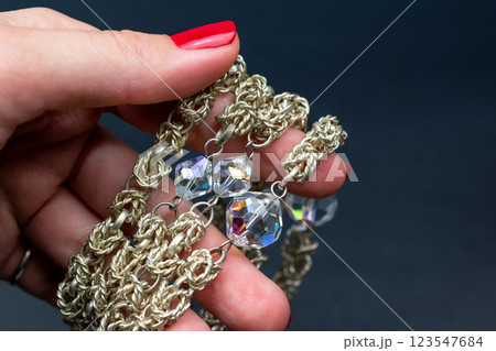 Unique necklace for women on a black background, promotional photo for an online vintage and handmade jewelry store  123547684