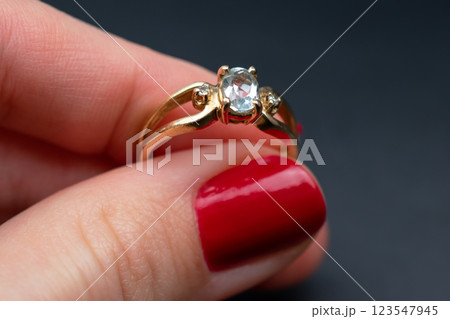 Statement ring for women on a black background, fine jewelry concept,  promotional photo for an online vintage and handmade jewelry store 123547945