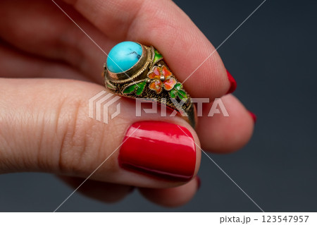 Statement ring for women on a black background, fine jewelry concept, promotional photo for an online vintage and handmade jewelry store Statement ring for women on a black background, fine jewelry concept, promotional photo for an online vintage and handmade jewelry store 123547957