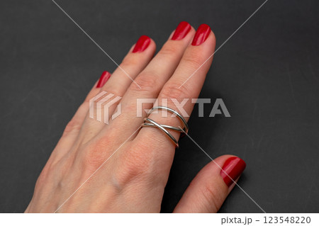 Statement ring for women on a black background, fine jewelry concept,  promotional photo for an online vintage and handmade jewelry store 123548220