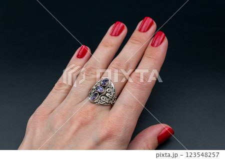 Statement ring for women on a black background, fine jewelry concept, promotional photo for an online vintage and handmade jewelry store Statement ring for women on a black background, fine jewelry concept, promotional photo for an online vintage and handmade jewelry store 123548257