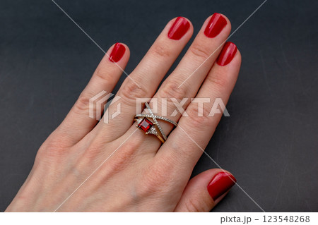 Statement ring for women on a black background, fine jewelry concept,  promotional photo for an online vintage and handmade jewelry store 123548268
